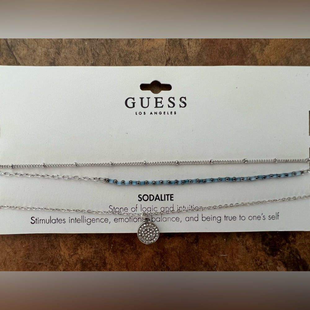 3 piece necklace by “Guess” never opened or worn !